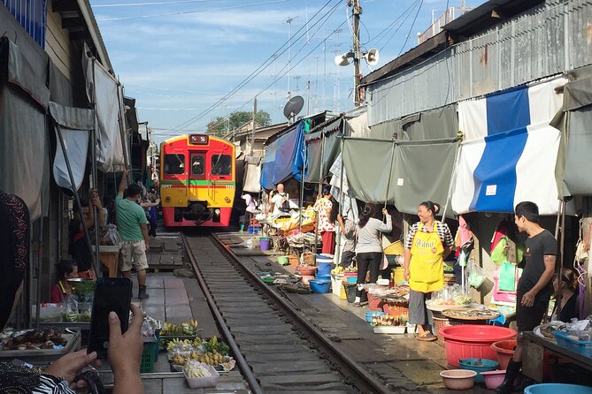 From Bangkok : Kanchanaburi Tour with Floating market Visit - Krasae Buddha Cave and the Death Railway train