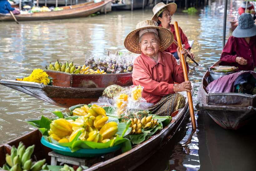 From Bangkok: Railway & Damnoen Saduak Floating Market Tour - Mae Klong Railway Market and the approaching train