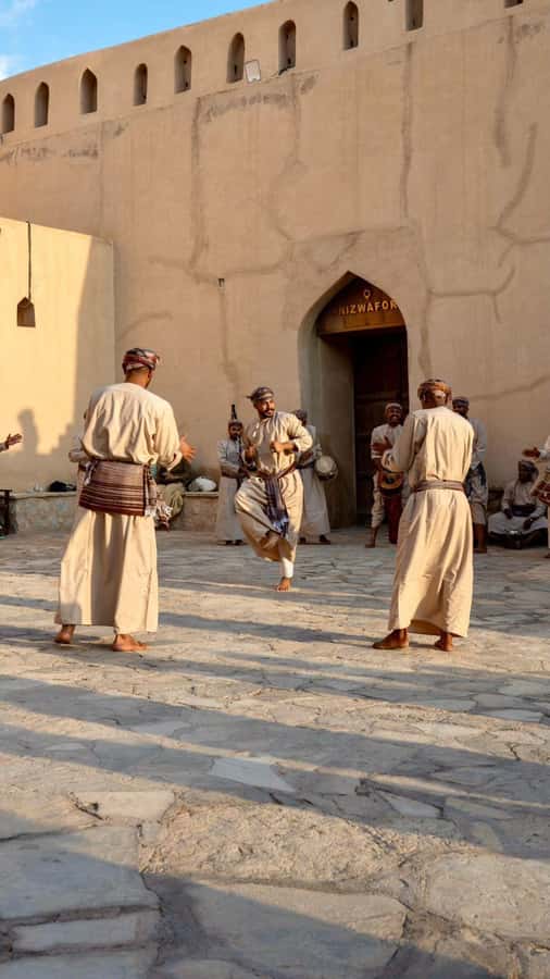 From Muscat: Nizwa Fort, Souq, falaj & Museum Full Day Tour - Entering Nizwa Fort and climbing its famous tower
