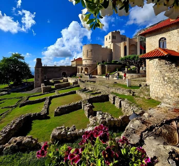 From Tirana/Golem/Durres: Kruja, Bazaar, Sari Salltik Tour - Pickup, traffic, and the van ride