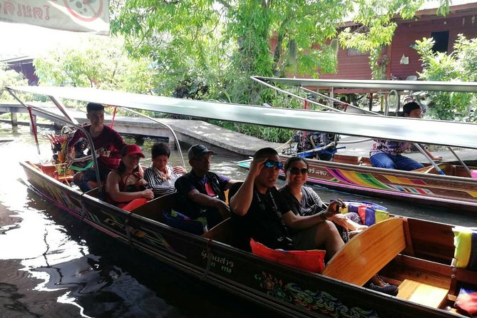 Full-Day Floating Market and Maeklong Railway Market Private Tour from Bangkok - Maeklong Railway Market and the train that cuts through it