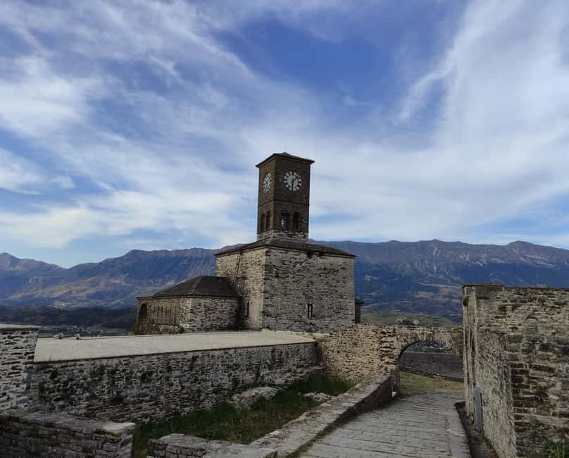 Gjirokaster: Old Bazaar and Castle Private Walking Tour - The communist-era obelisk adds a sharper turn