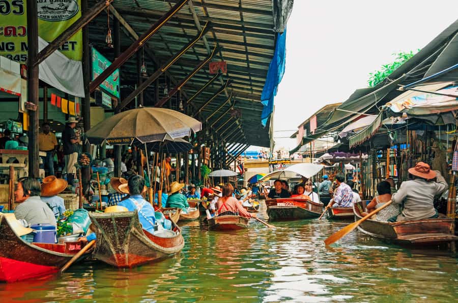 Grand Palace, Damnoen Floating Market & Maeklong Market Tour - Lunch and Thai food at your own cost