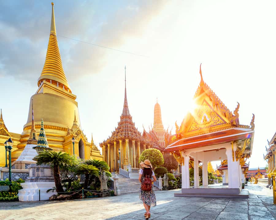 Grand Palace, Damnoen Floating Market & Maeklong Market Tour - Temple clothing and walking conditions
