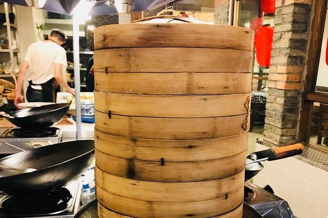 Half-Day steamed Buns Cooking Class with a Local Market Visit - Making baozi with a professional chef