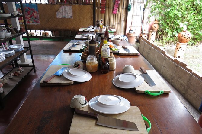 Half-Day Thai Cooking Class and Market Tour From Chiang Mai - Cooking five dishes at your own station