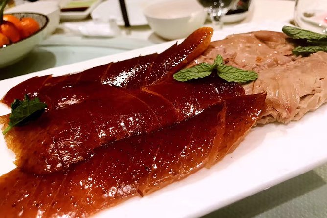 Half Day Tour:Market Shopping Acrobatic Show & Peking Duck dinner - Red Theatre: a fast, colorful finish