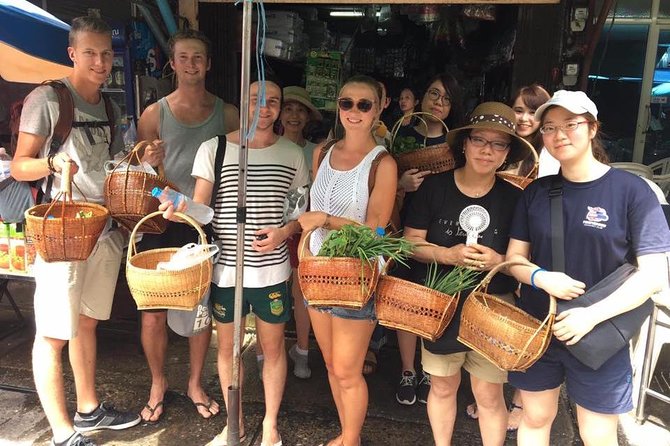 Hands on Thai Cooking Class and Market Tour - The instructors make the class work