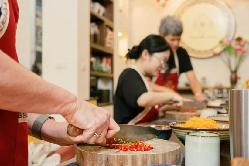 Hanoi Cooking Class: Market Tour, Free Recipe & Beverages - Eating the meal you prepared