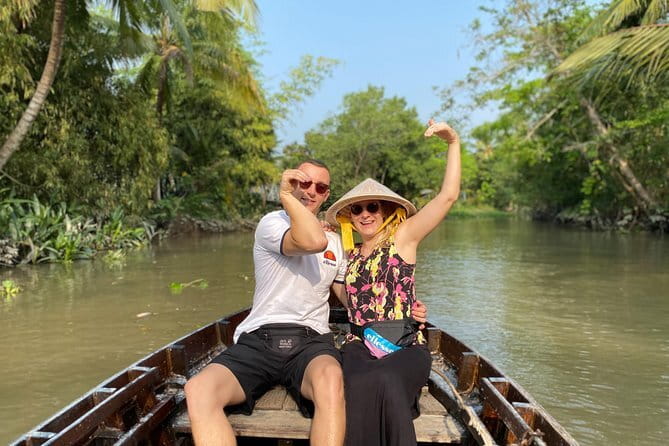 Hau River Floating Market and Con Son Islet Adventure - Making Vietnamese cakes and pop rice
