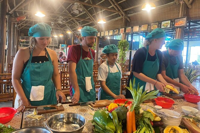 Hoi An Cooking Class With Market Tour and Bamboo Basket Boat Ride - Bay Mau Coconut Village by round basket boat
