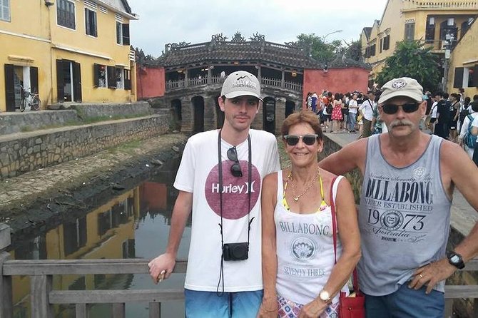 Hoi An Night Market with Hoi an walking Tour , Colourful Lanterns, Boat Ride - Walking through Hoi An Ancient Town