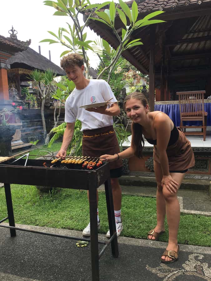 Jambangan bali cooking class with morning market tour - Entering a Balinese home with Putu’s family