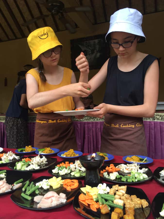 Jambangan bali cooking class with morning market tour - Coconut oil, offerings, and the meaning behind the meal
