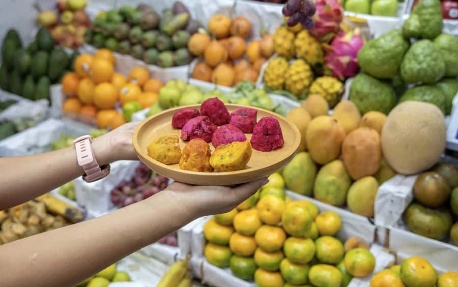 Lima: Market Tour and Cooking Class with Pisco Sour - Moving from market stalls to the cooking class