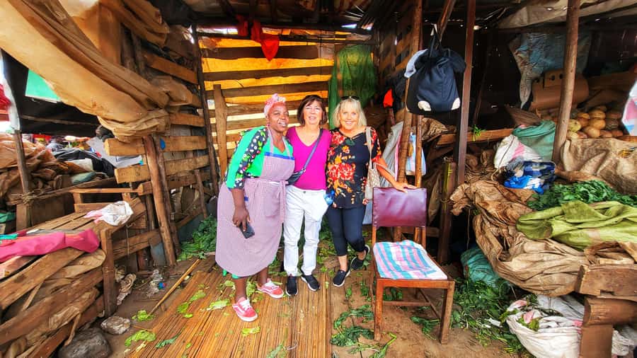 Local Market Tour and Traditional Meal Cooking Class - Walk through a working Kenyan food market