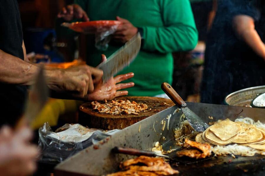 London: Camden Market Food Tour with 7 Street Food Tastings - Camden Market with a plate in hand