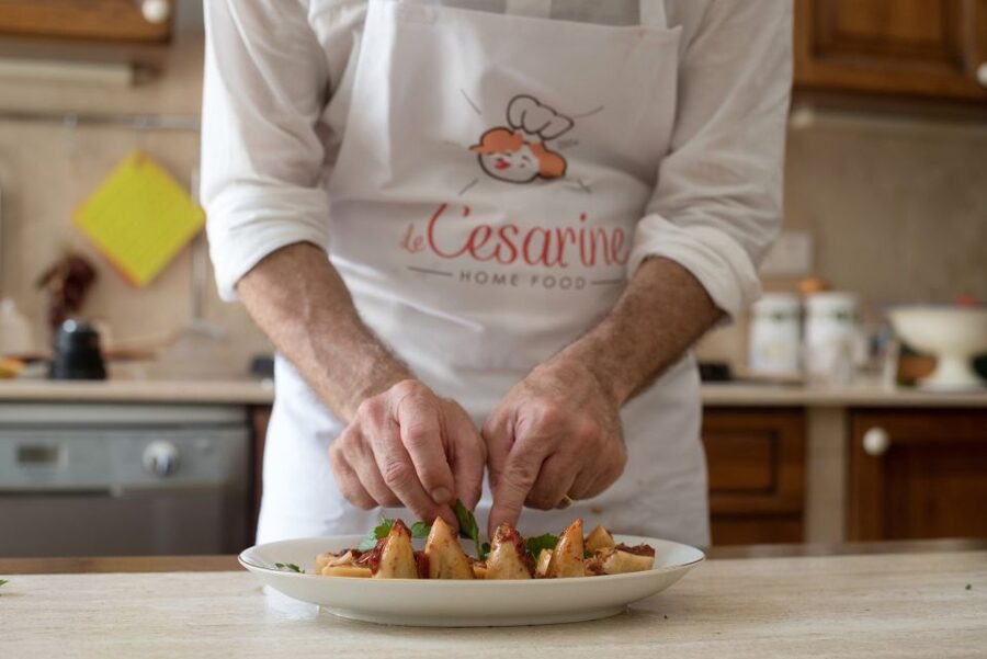 Lucca: Market and Cooking Class at a Local's Home - Sitting down to eat what you made
