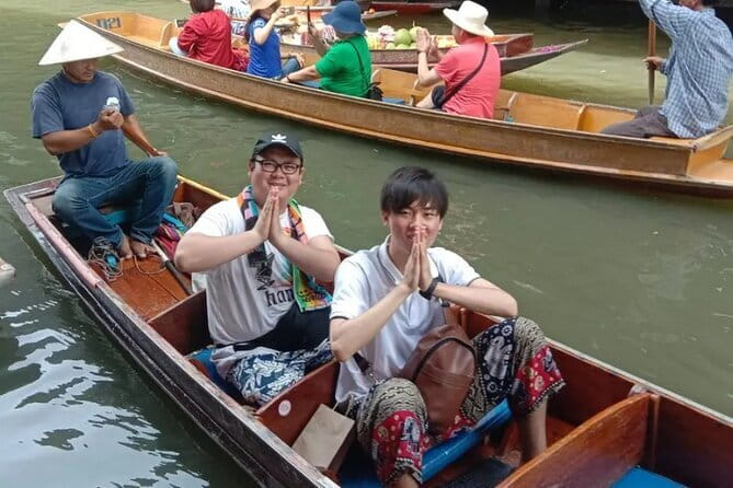 Maeklong Railway and Damnoen Saduak Floating Market Tour - Devaree Boutique and the Amphawa stop