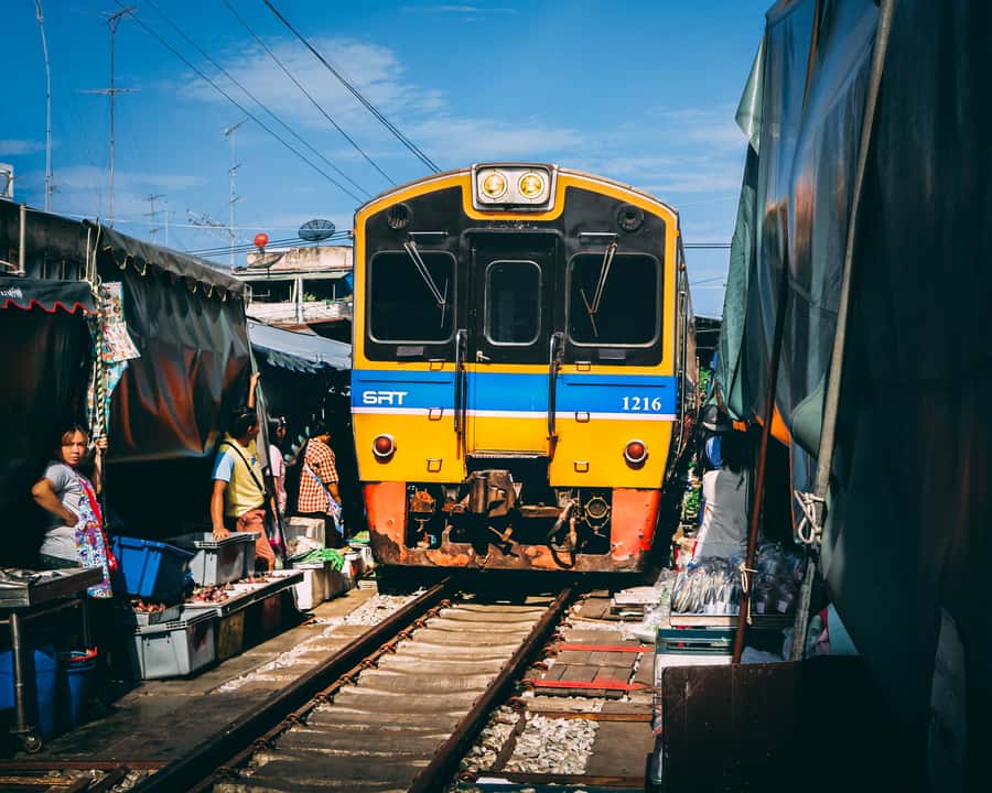 Mahachai & Maeklong Railway Market Day Tour From Bangkok - Mahachai’s fishing community by long-tail boat