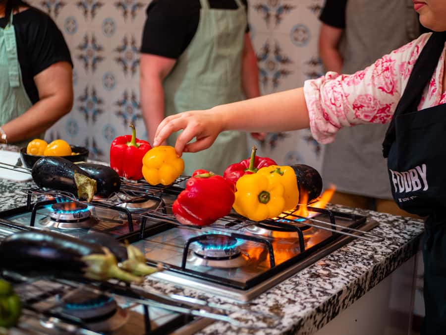 Marrakech: Moroccan Cooking Class with Market Visit and Meal - Sitting down to eat what you prepared