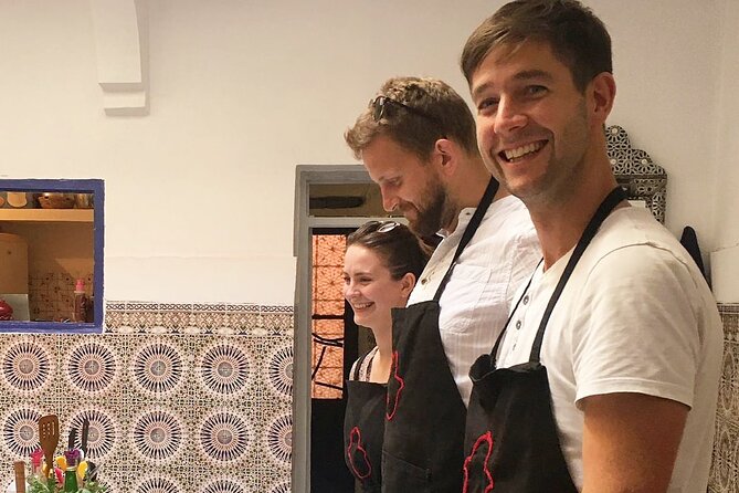 Moroccan Cooking Class & Marrakech Market Visit with Chef Khmisa - Sitting down to the meal