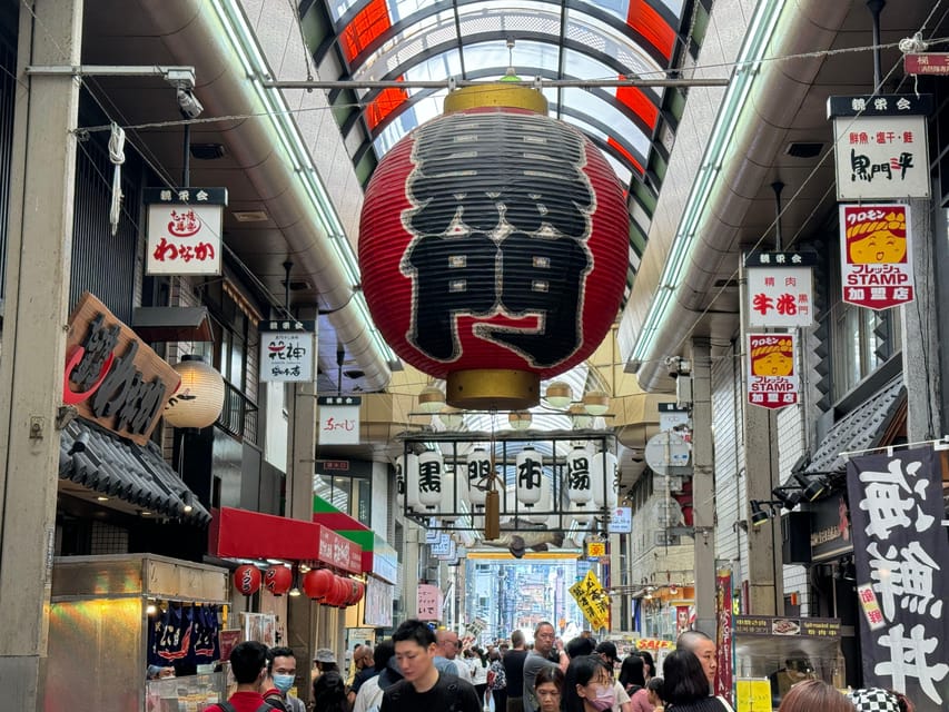 Osaka: Kuromon Market 1.5-Hour Seafood & Street Food Tour - The First Market Tasting: Seafood and Local Choices