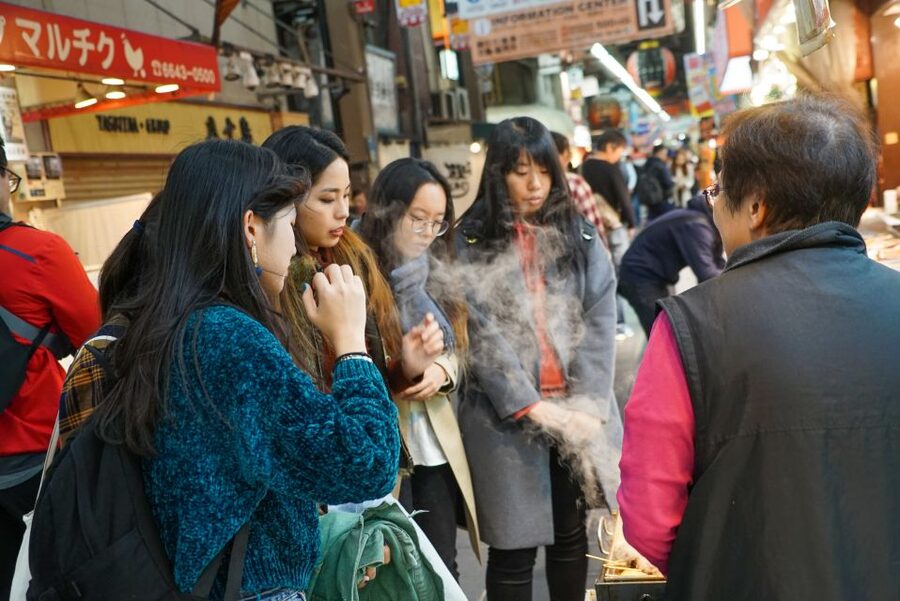Osaka: Kuromon Market Food Walking Tour (6 stops, 6 tastes) - Meeting your guide near Nipponbashi Station