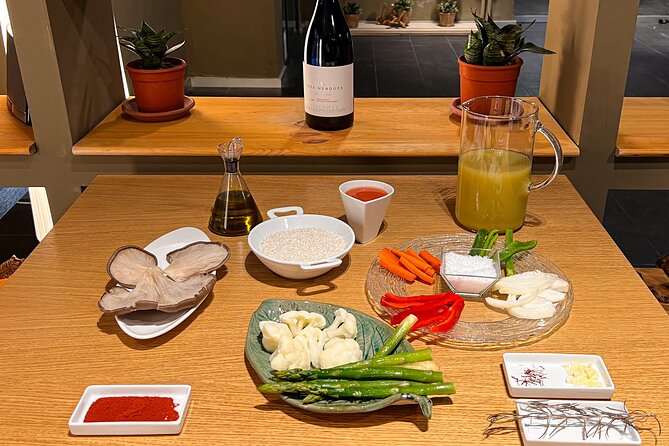 Paella Cooking Class, Wine Tasting & Central Market in Valencia - Timing, meeting point, and cancellation