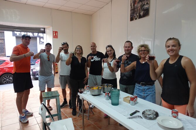 Paella & Sangria Class with Tapas and Market Visit - Sitting down to eat what you prepared