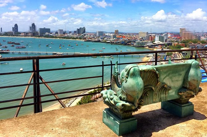 Pattaya Viewpoint, Big Buddha & Floating Market with Lunch - Gems Gallery adds a polished shopping stop