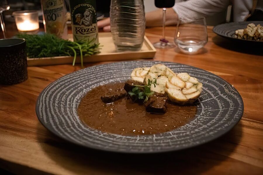 Prague: Traditional Czech Cooking Class with Market Tour - Sitting down to eat what you cooked