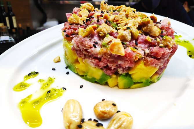 PREMIUM TAPAS TOUR: Paella, Market Tastings, and Winery - A short walk through central Malaga