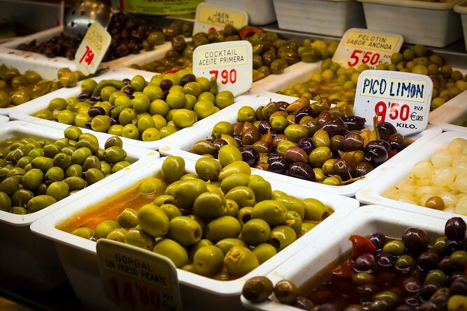 PREMIUM TAPAS TOUR: Paella, Market Tastings, and Winery - Paella and salad near the Picasso Museum