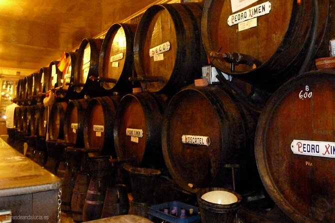 PREMIUM TAPAS TOUR: Paella, Market Tastings, and Winery - Inside Atarazanas Market with a local guide