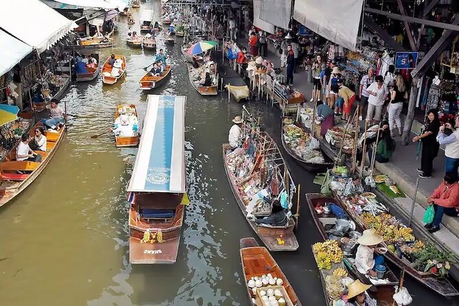 Private Damnoen Saduak and Maeklong Railway Market Tour(min 2pax) - Maeklong Railway Market and the Umbrella Pulldown