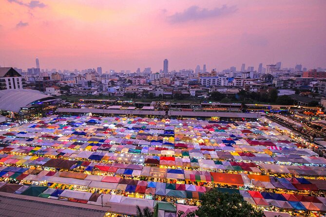 Private Guided Tour to Train Market and Damnoensaduak Floating Market - What the day feels like in practice