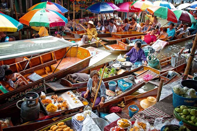 Private Guided Tour to Train Market and Damnoensaduak Floating Market - Who should book this private Bangkok day trip?