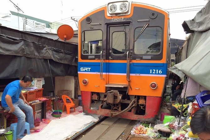 Private Maeklong Railway Market and Amphawa Day Tour from Bangkok - Food, shopping, and extra costs