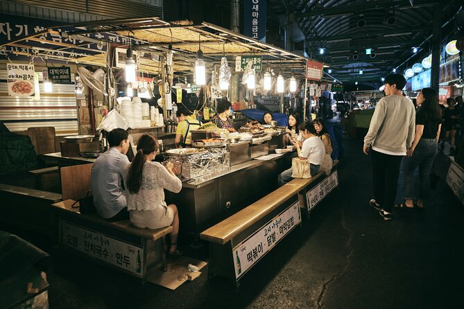 Seoul Night Palace & Market Food Tour with Vehicle - Jogyesa Temple and the lantern-lit finish