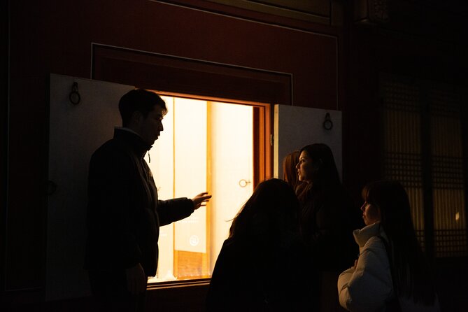 Seoul Night Palace & Market Food Tour with Vehicle - Changgyeonggung Palace under evening lights