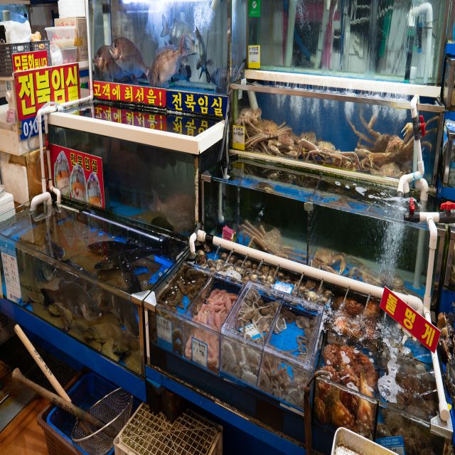 Seoul: The Biggest Sea-food Noryangjin Market Tour - Seeing fish become a meal