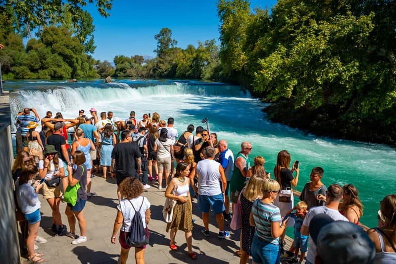 Side: Manavgat River Boat Trip & Grand Market w/ Lunch - Boarding a 45-passenger wooden boat