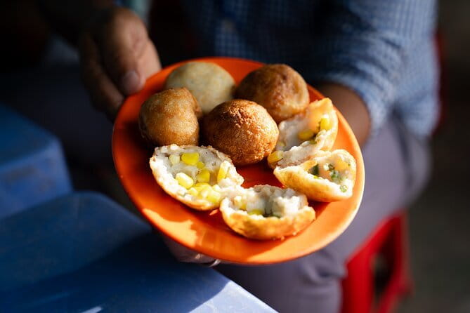 Siem Reap Morning Market & Food Tour by Tuk Tuk - Royal Independence Gardens gives the morning breathing room