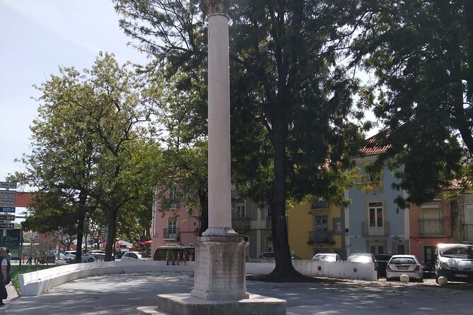 South of Lisbon: Local Market & Canned Sardines Factory Tour - Churches, lanes, and the older center