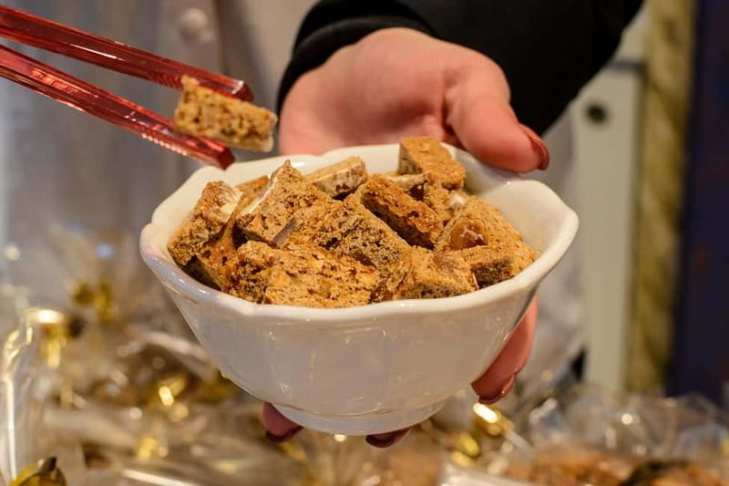 Strasbourg Christmas market tour and culinary city tour with tastings - Savory bites with cheese, bread, and local flavor