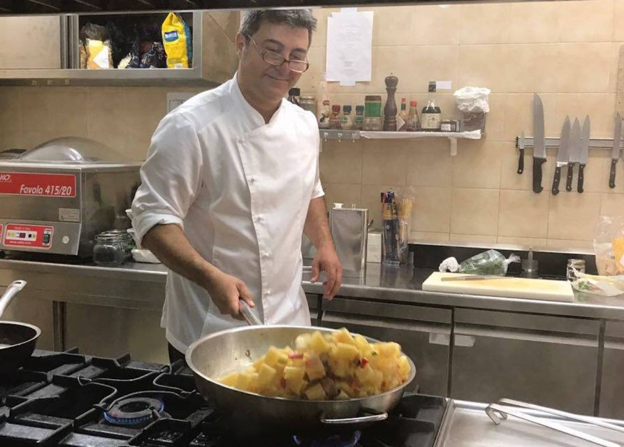 Syracuse: Traditional Cooking Class & Ancient Market Visit - Cooking with a chef who teaches through the food