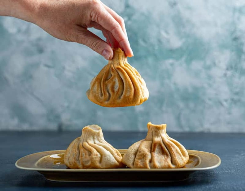 Tbilisi: Street Food & Sightseeing Tour with Local Markets - Four kinds of khinkali in one sitting