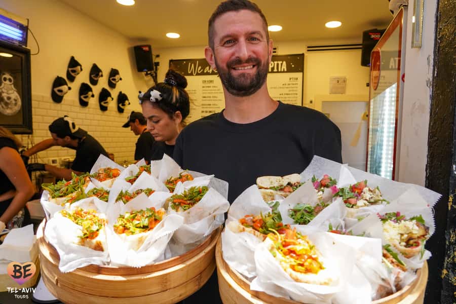 Tel Aviv: 2-Hour Carmel Market Tour in English with Lunch - Following the food from stall to stall