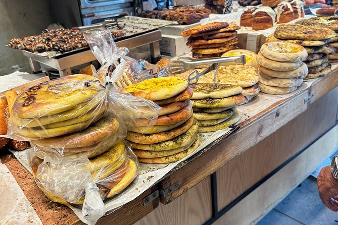 Tel Aviv: Carmel Market Food Tasting Tour “Shuk Hacarmel” - Family stalls, fresh falafel, and pita dishes